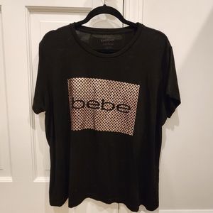 Bebe womens black short sleeve tee with gold foil. Size 2X - like new condition